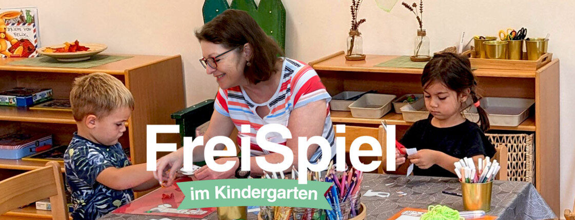 Freiwillige begleitet zwei Kinder beim Basteln
